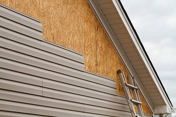 Professional Emergency Siding Repair technician working in Clinton, MD